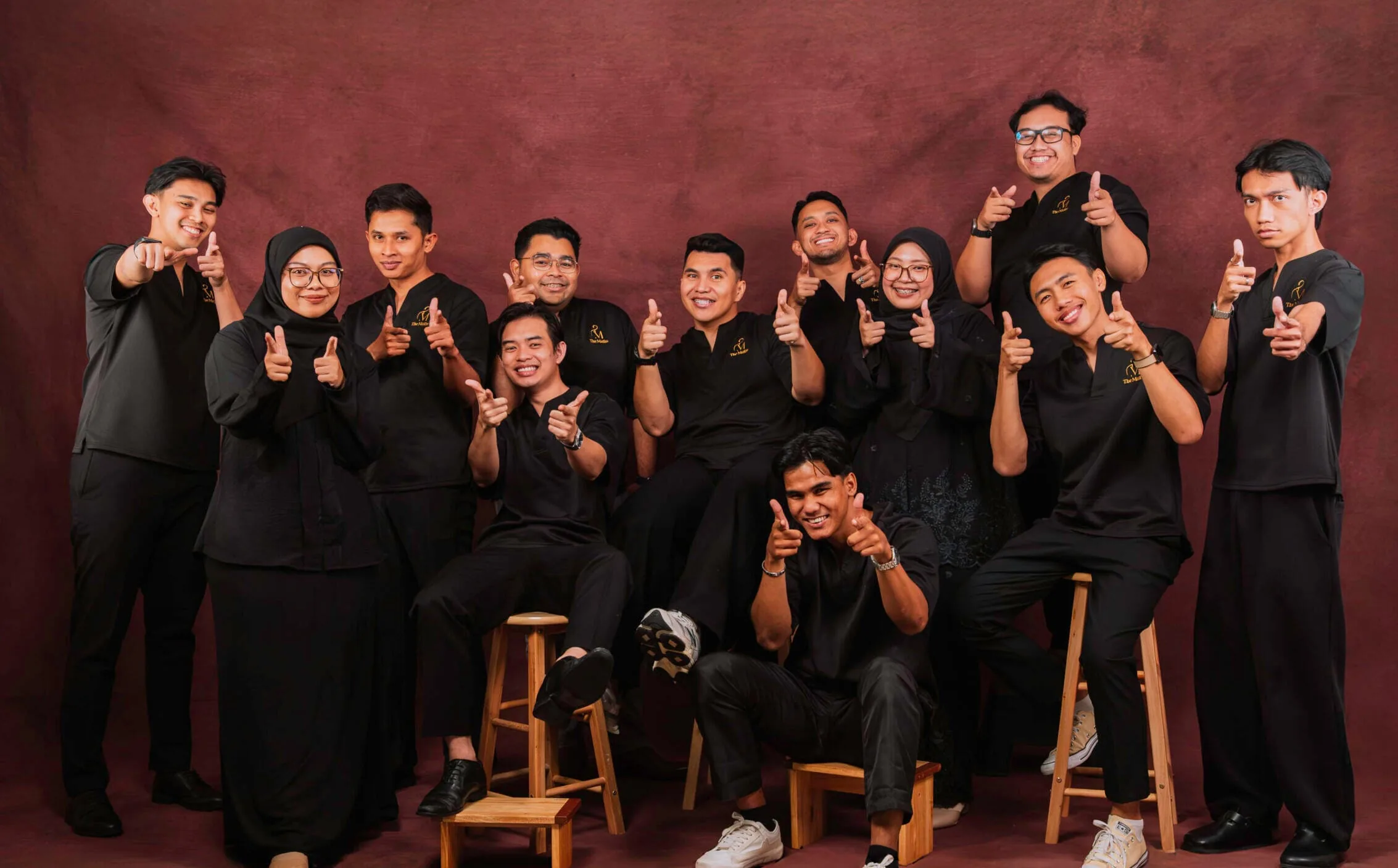 The Majlis wedding coordination team in black uniforms